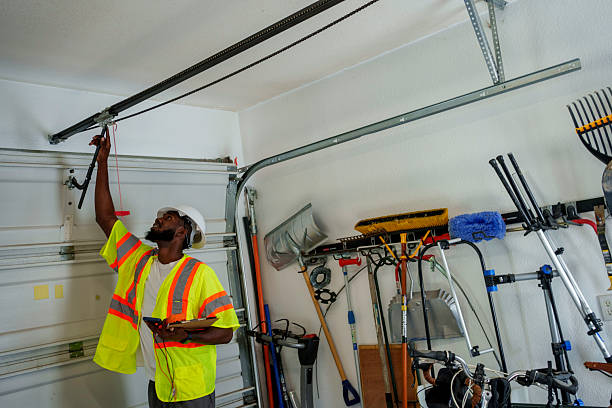 Professional Garage Door Panel Replacement technician working in Dunes City, OR